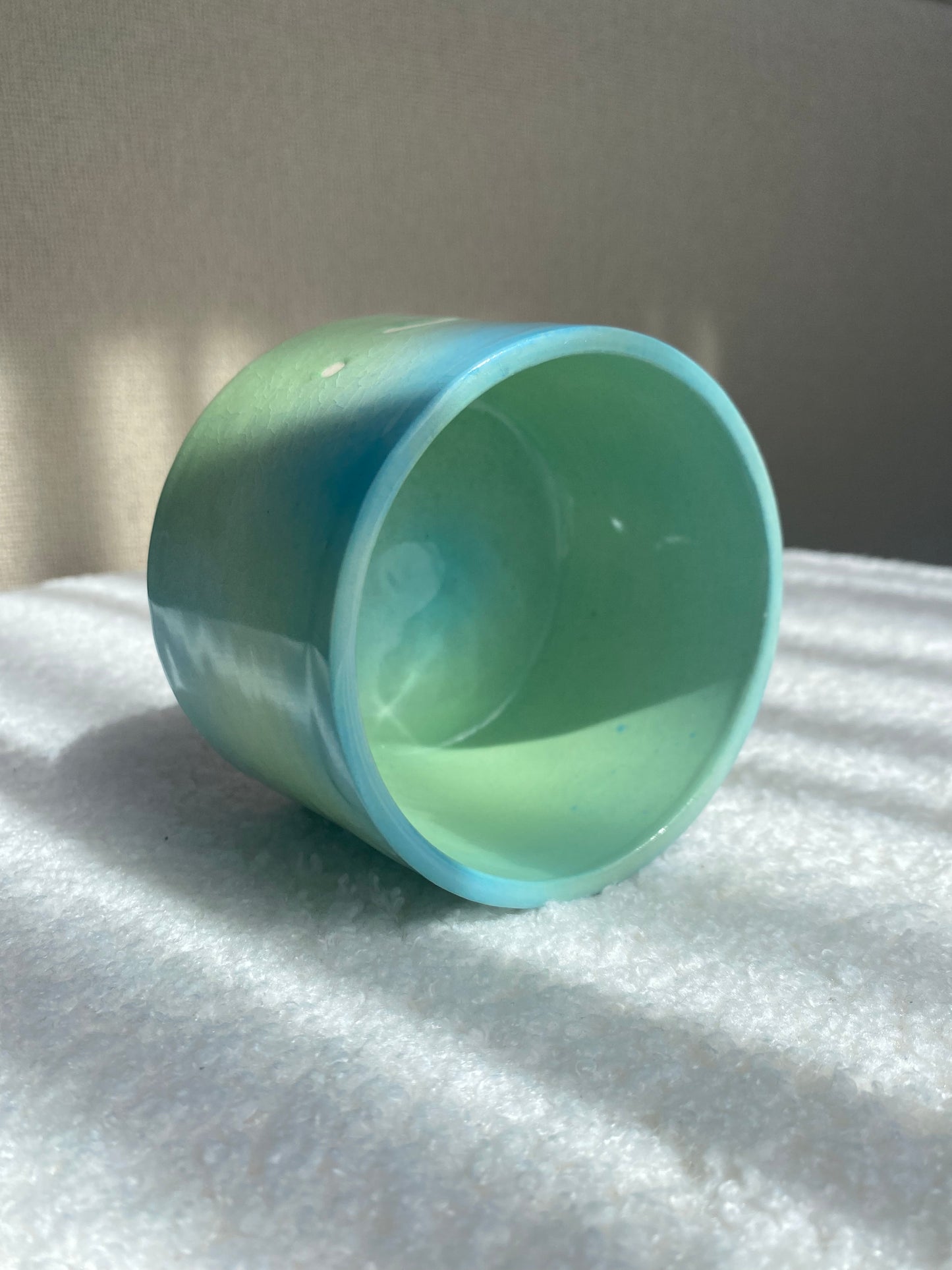 Blue and green gradient sad volcano