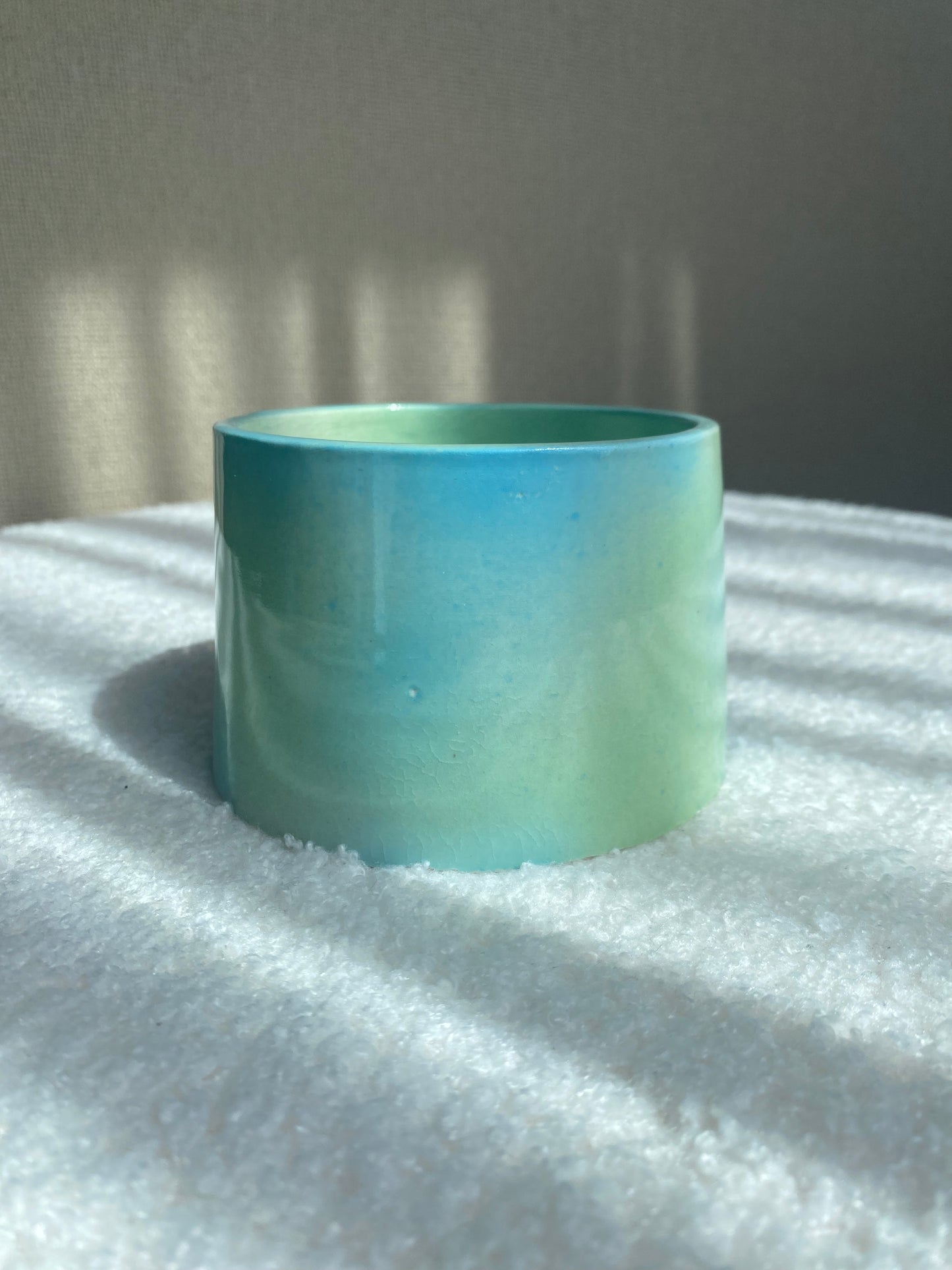 Blue and green gradient sad volcano