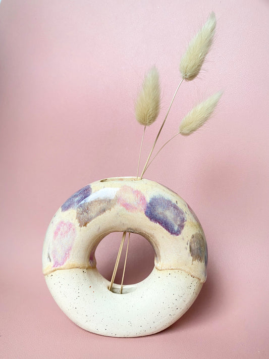 Multicoloured painted donut vase