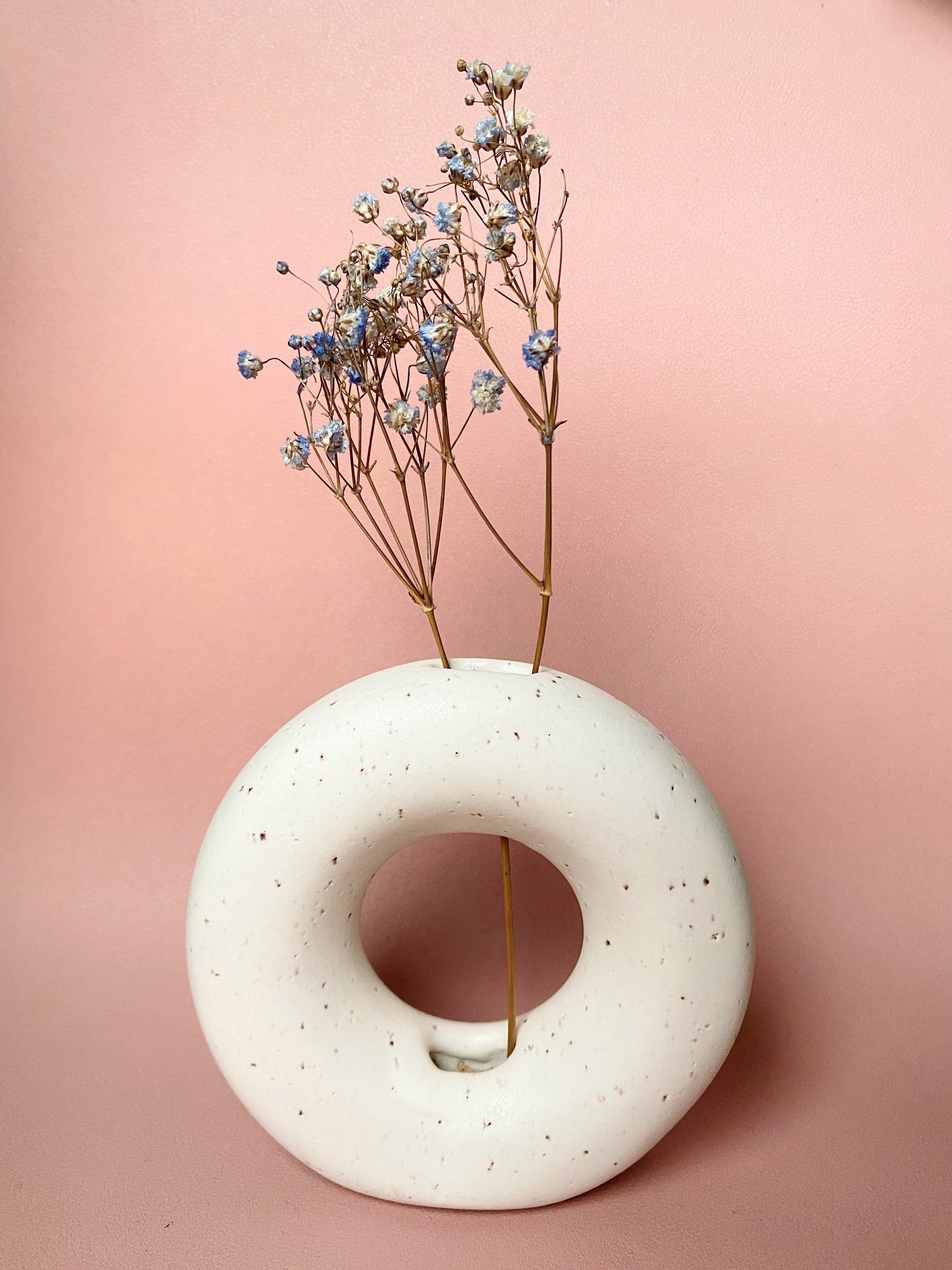 White speckled donut vase