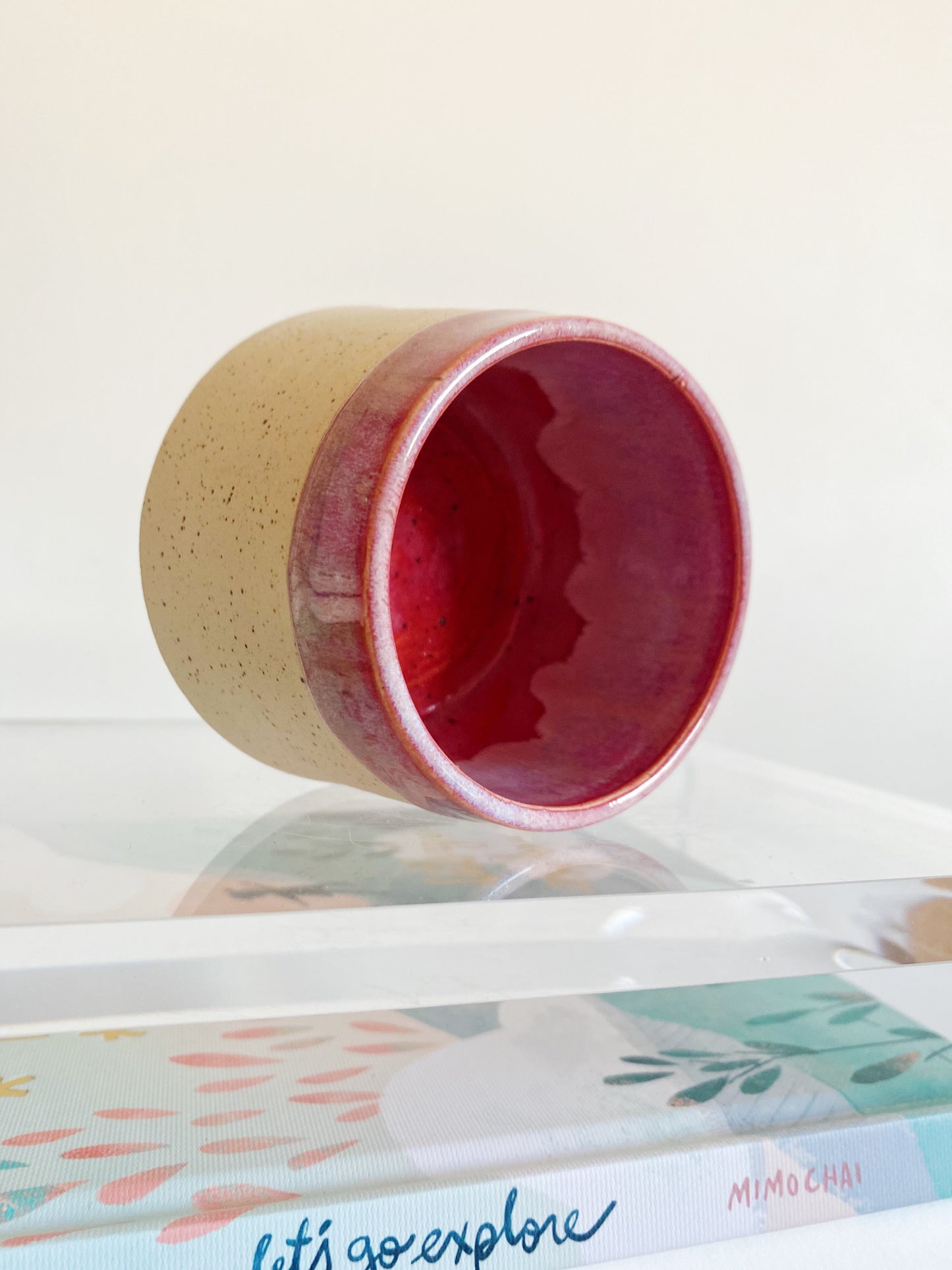 Speckled angry volcano holding flowers