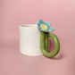 Mug with blue flower handle (option a)