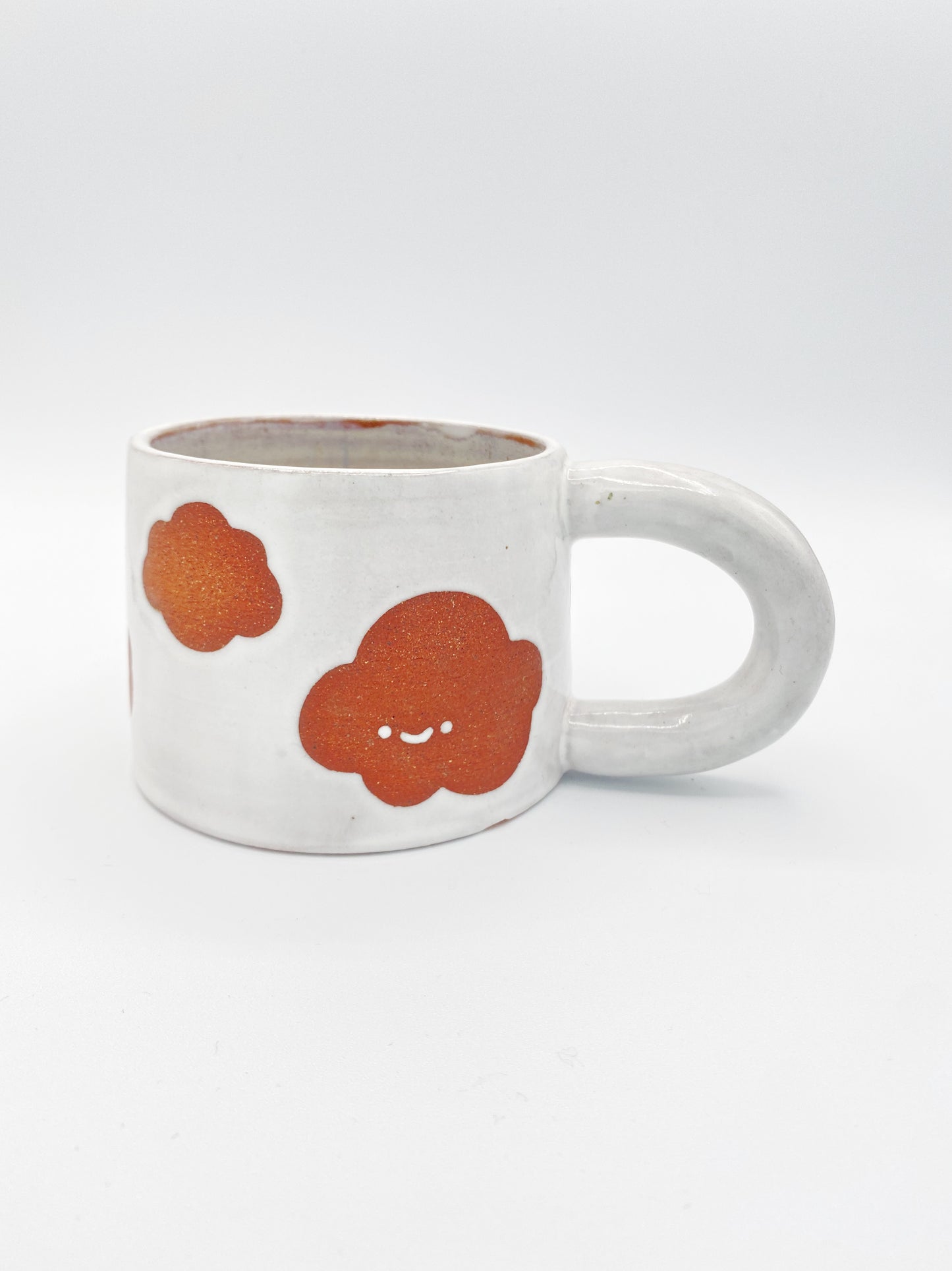 Two faced cloud mug