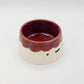 Happy maroon scalloped volcano