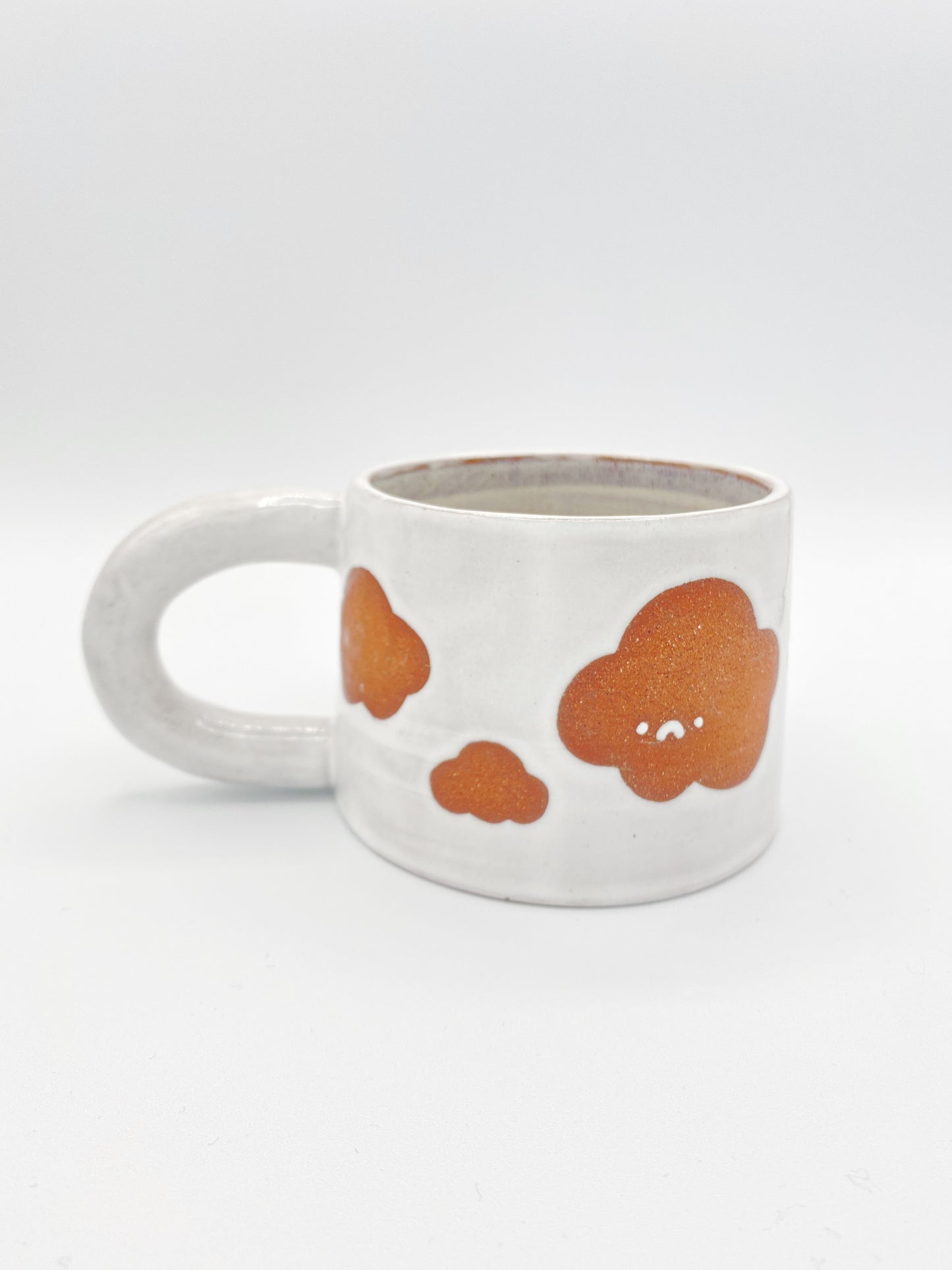 Two faced cloud mug